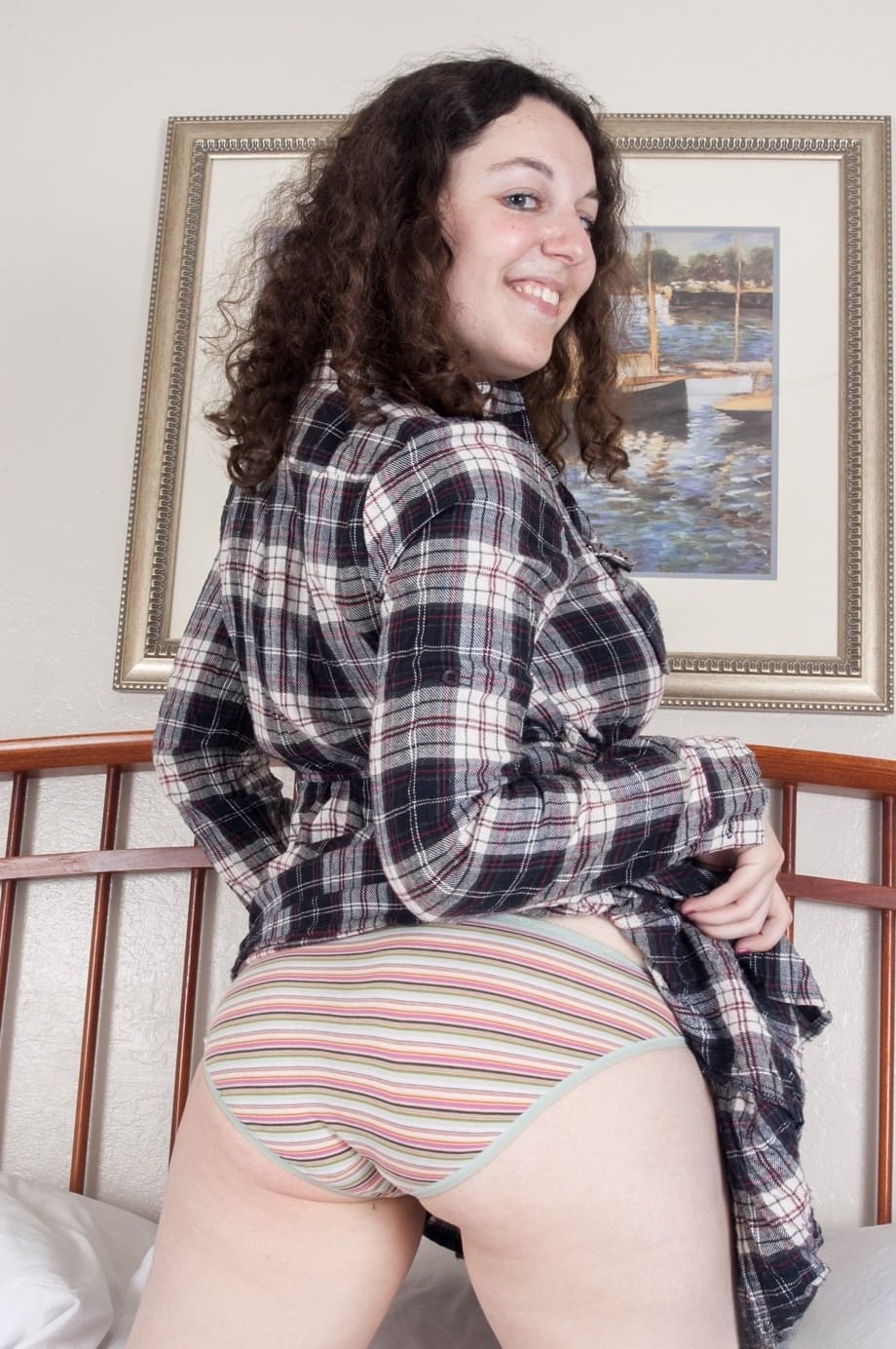 Chubby brunette Tamar flaunts her large breasts and spreads her hairy pussy