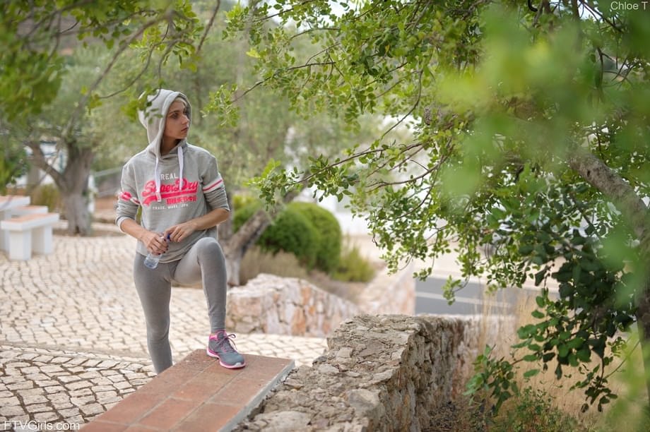 Tiny blonde teen Chloe works out in a hoodie & shows her small tits in public