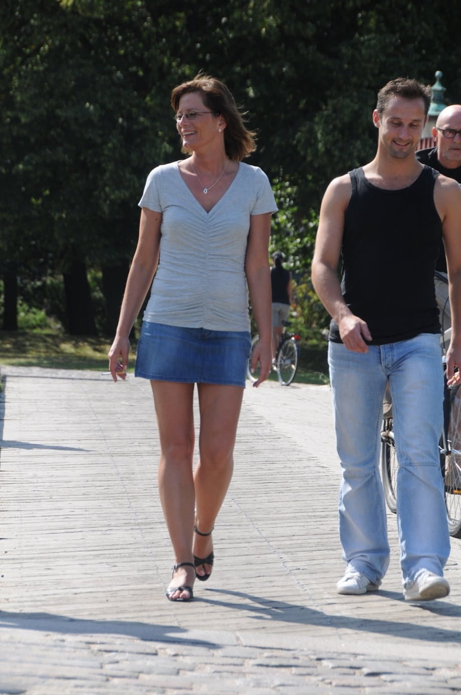European mature with small tits Lilje gets fucked by two guys in the park