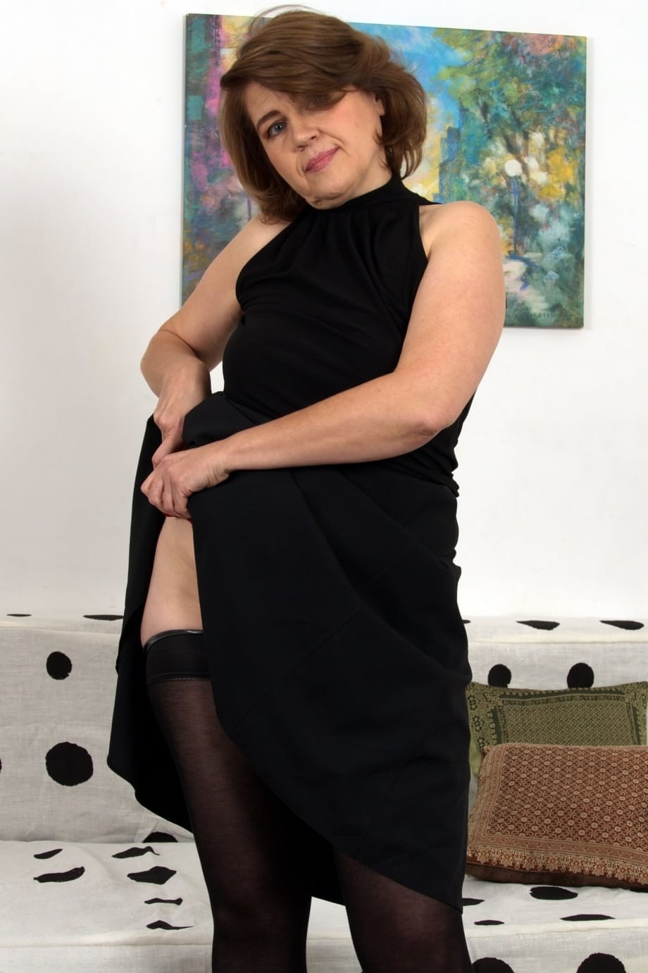 Dirty mature Larisa masturbates with a long dildo as she's home alone & horny