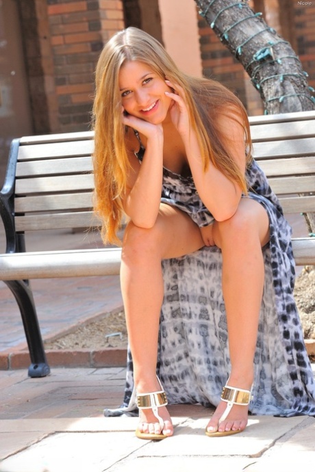 Marvelous amateur babe Nicole flashing her sexy booty and pussy in public