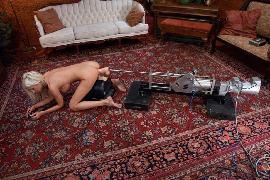 Sexy mature pornstar Puma Swede gets fucked doggystyle by a machine dildo