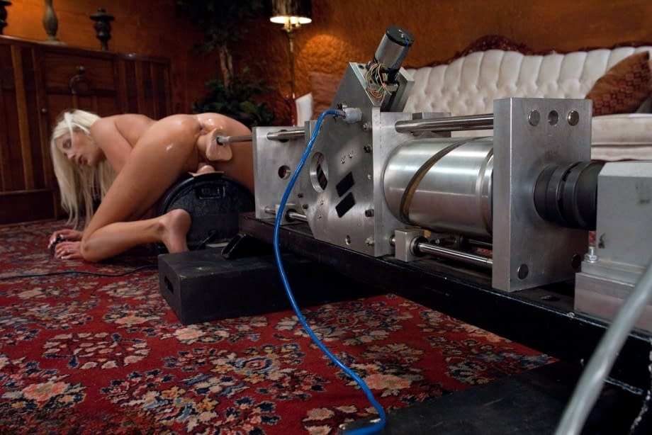 Sexy mature pornstar Puma Swede gets fucked doggystyle by a machine dildo