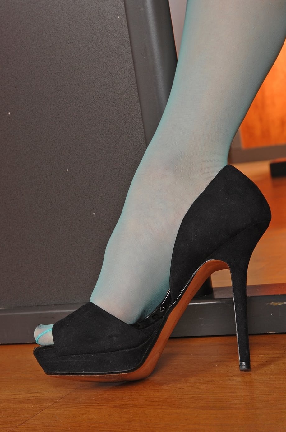 Hungarian hottie Kitty Cat gets her stockings stripped before giving a footjob