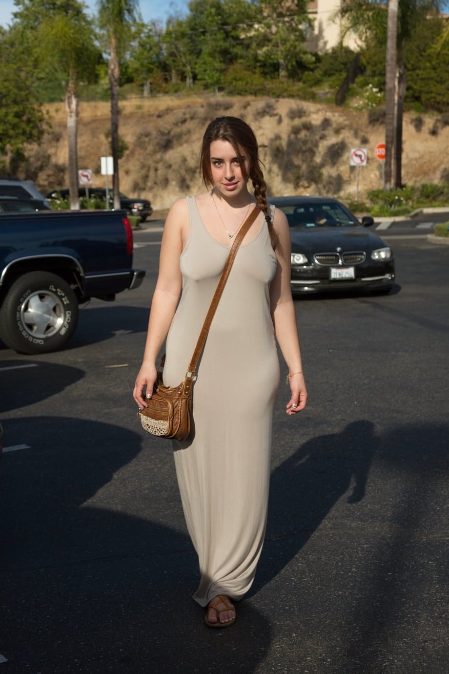 Teen babe Lanie Morgan exposes her big juggs and shaved vagina in public