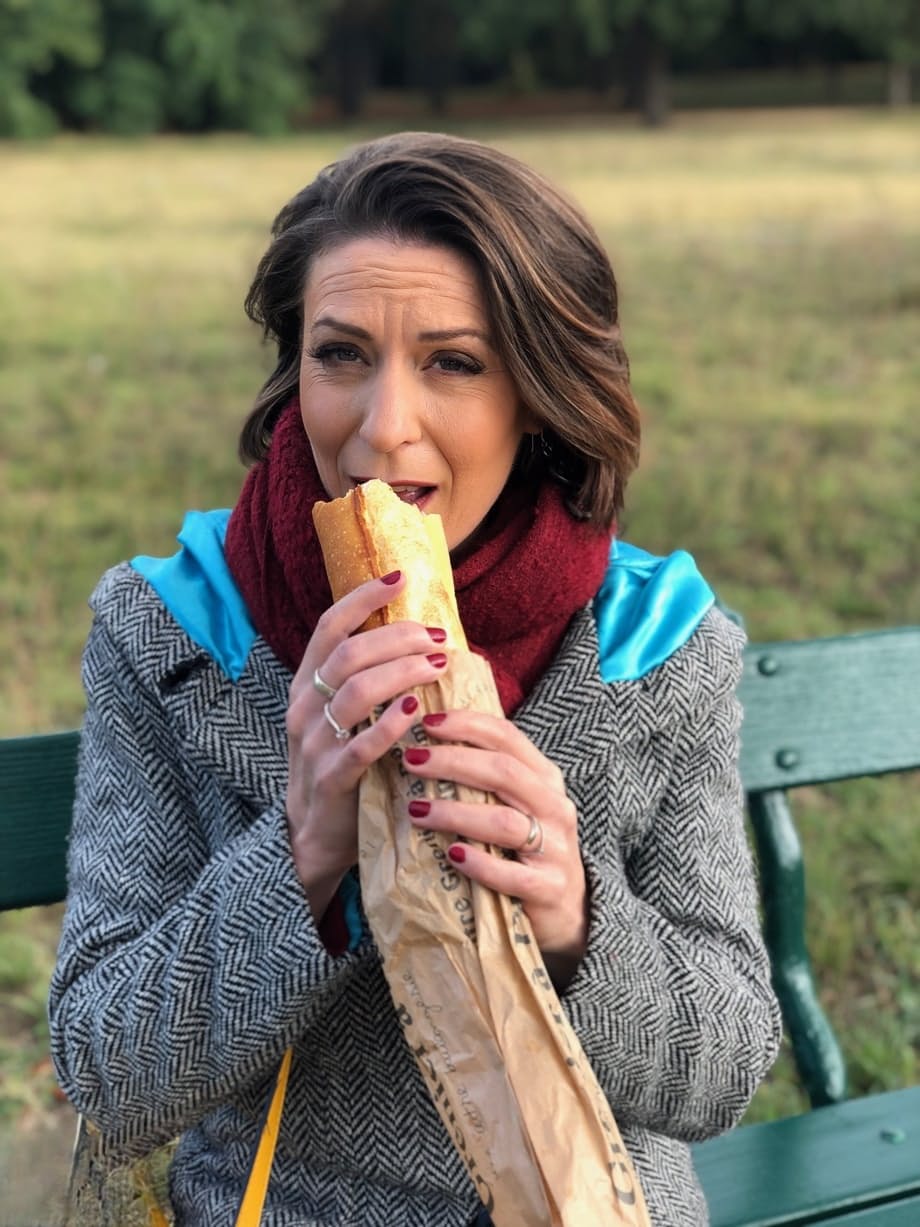 French mom Anya flashes her legs in stockings while eating a sandwich outside