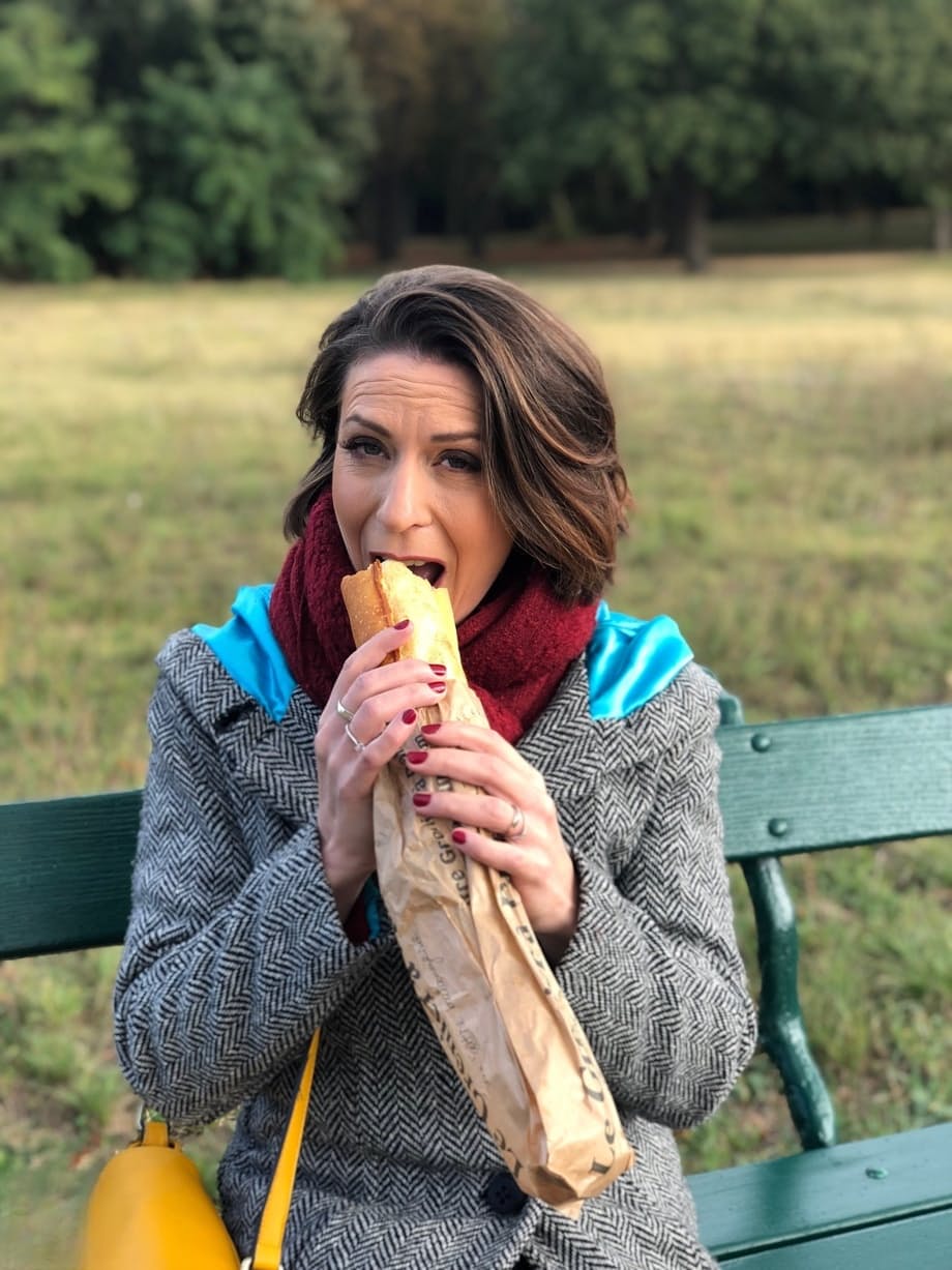 French mom Anya flashes her legs in stockings while eating a sandwich outside