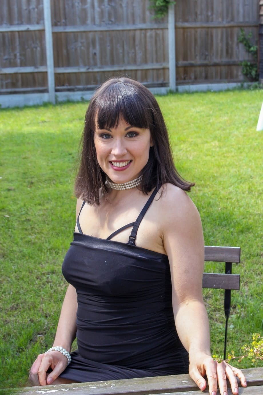 Brunette MILF Lucy Love reveals her yummy butt and nice tits before toying