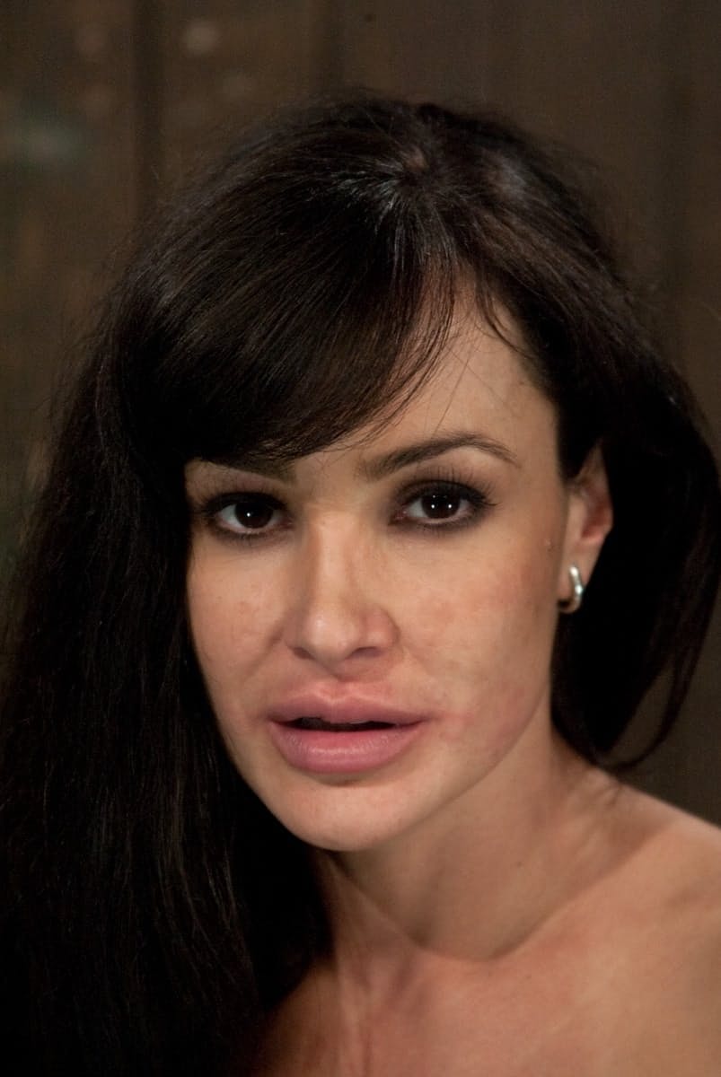 Sexy MILF Lisa Ann gets her nips clamped & weighted while hanging in ropes