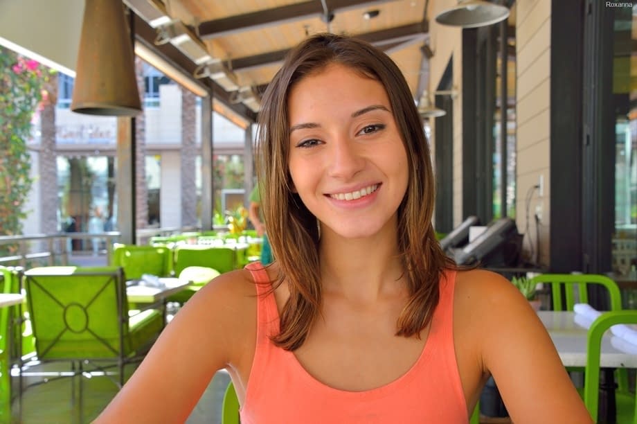 Adorable skinny teen Roxanna flashes her trimmed vagina in public