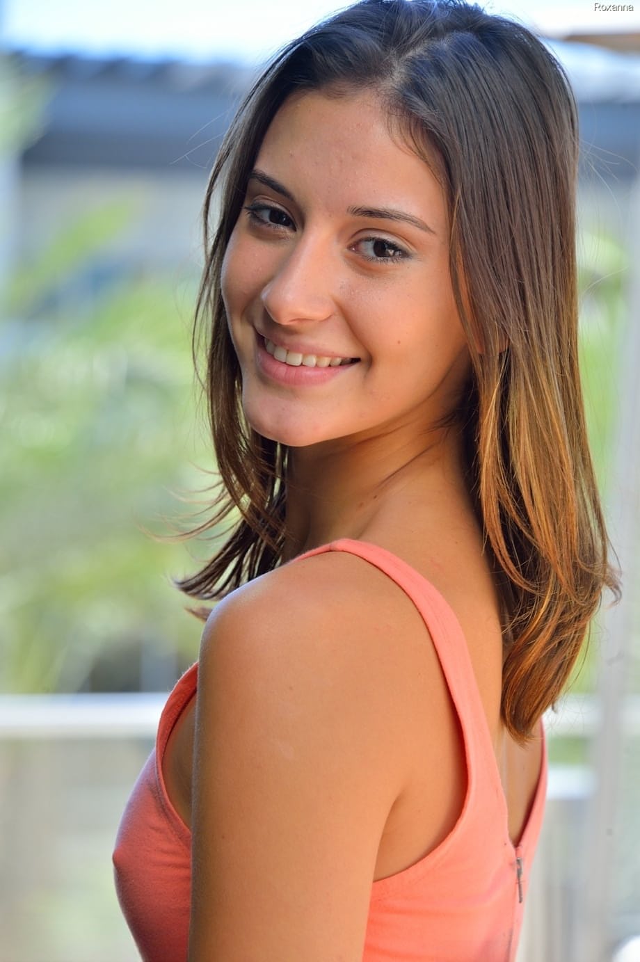 Adorable skinny teen Roxanna flashes her trimmed vagina in public