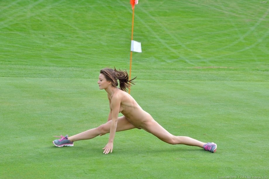 Petite blue-eyed brunette Lana strikes sexy nude poses outdoors