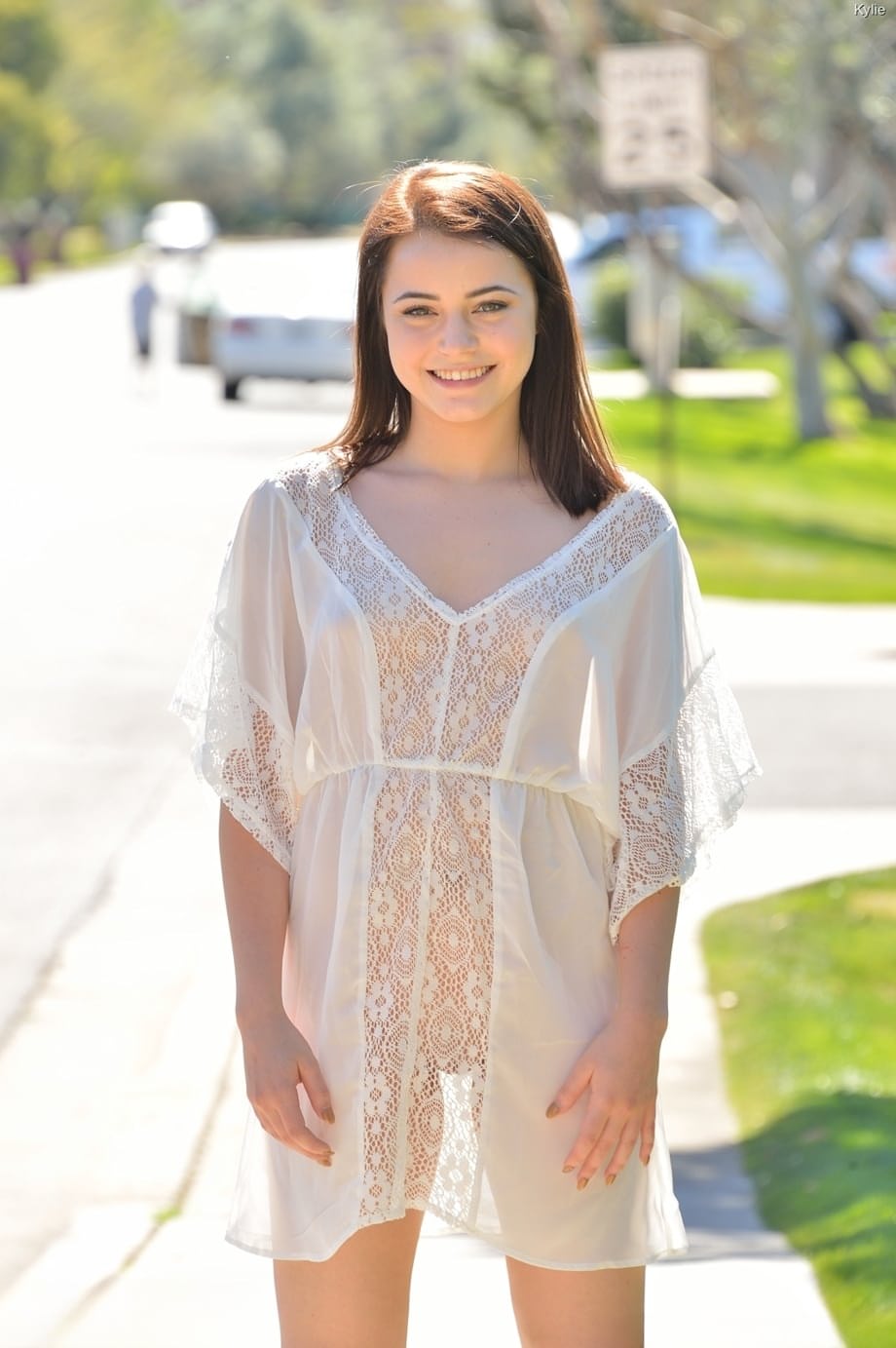 Cute brunette Kylie doffs her white outfit and reveals her fantastic body