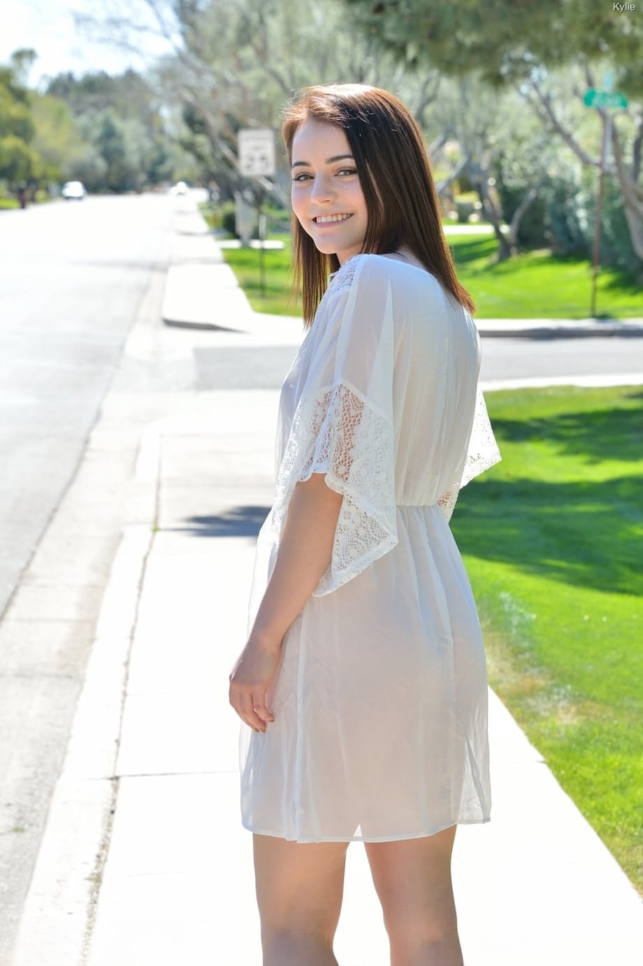 Cute brunette Kylie doffs her white outfit and reveals her fantastic body