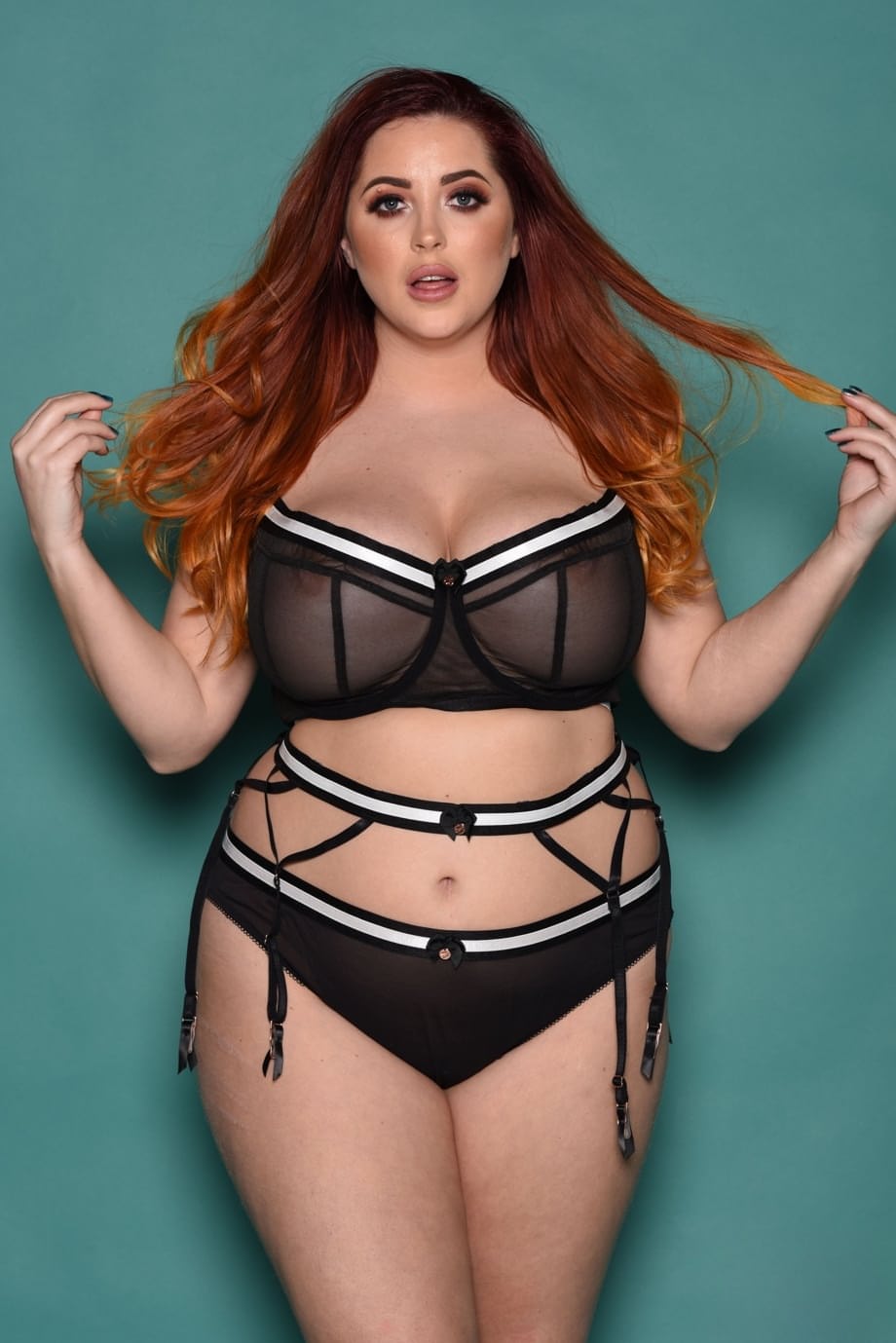 Plump British redhead Lucy Vixen flaunts her all natural phenomenal boobs