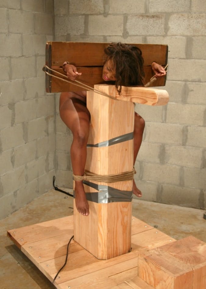 Ebony slut Sinnamon Love endures a lot of cock while restrained in bondage
