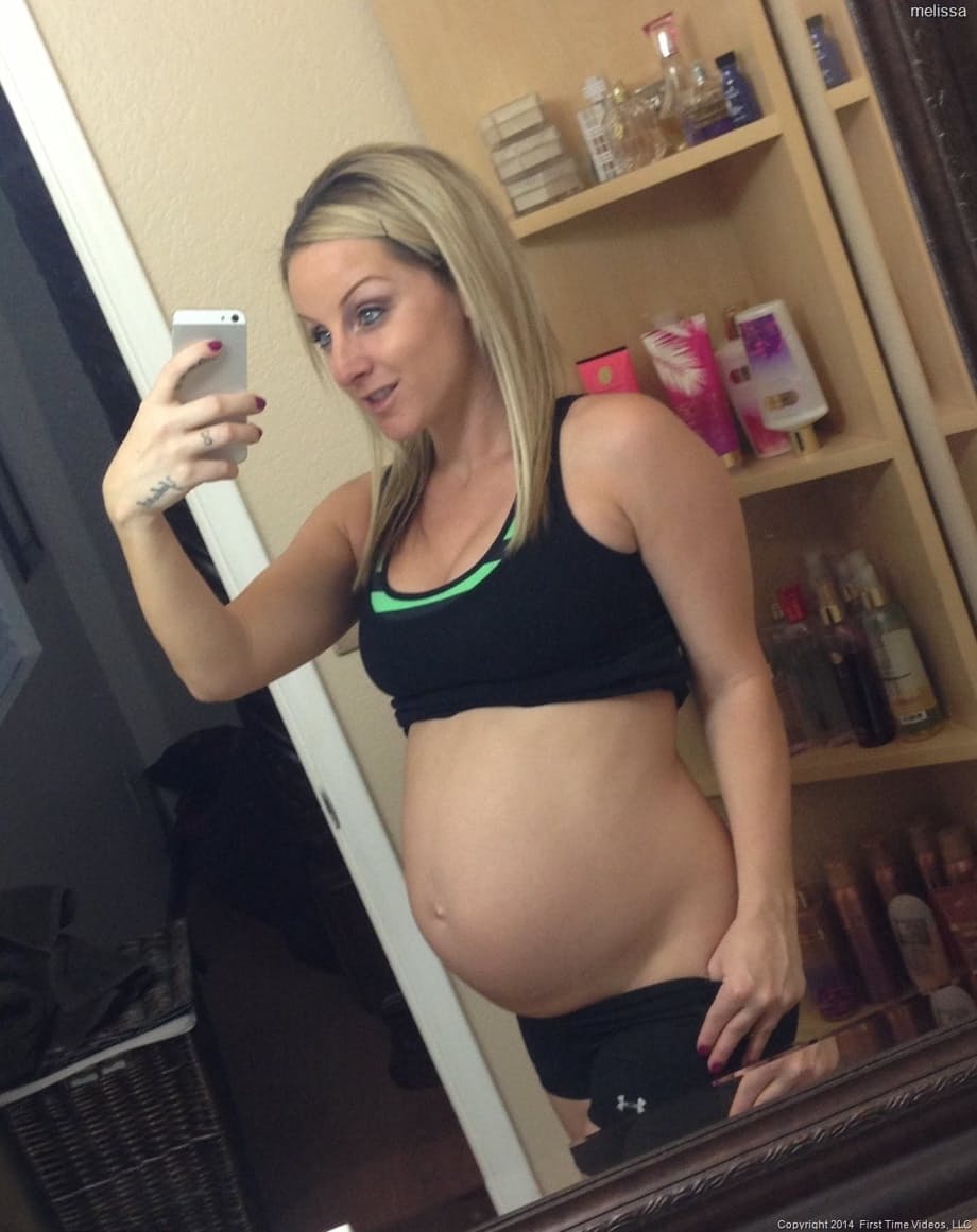Big-boobed pregnant blonde Melissa taking selfies in the mirror