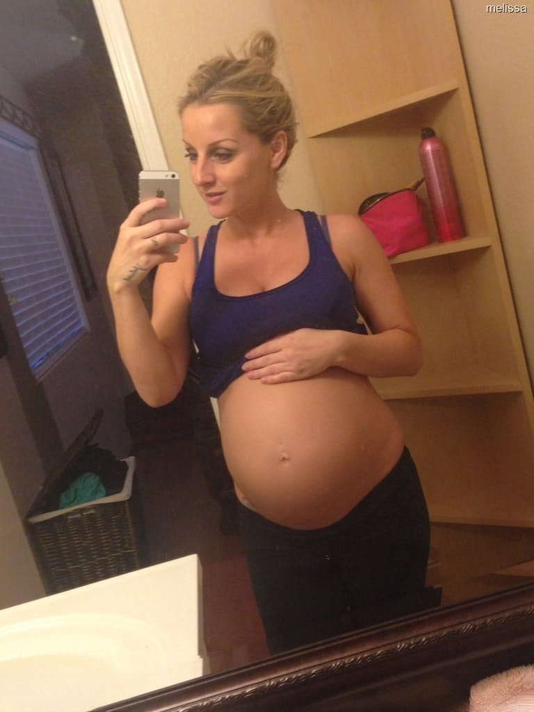 Big-boobed pregnant blonde Melissa taking selfies in the mirror