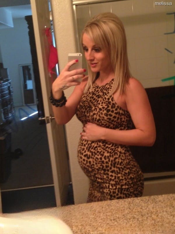 Big-boobed pregnant blonde Melissa taking selfies in the mirror