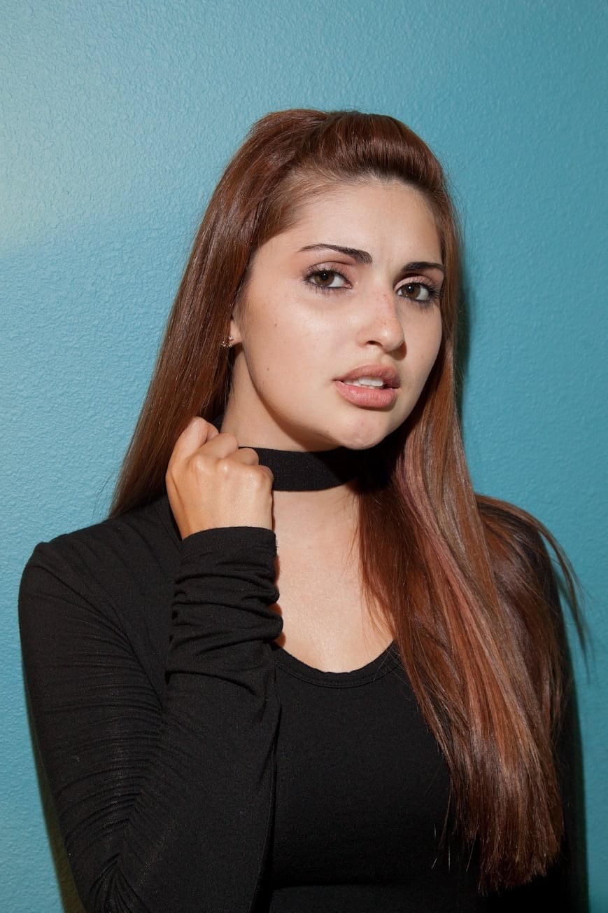 Slutty teen secretary Jade Couture poses provocatively in hot lingerie at work