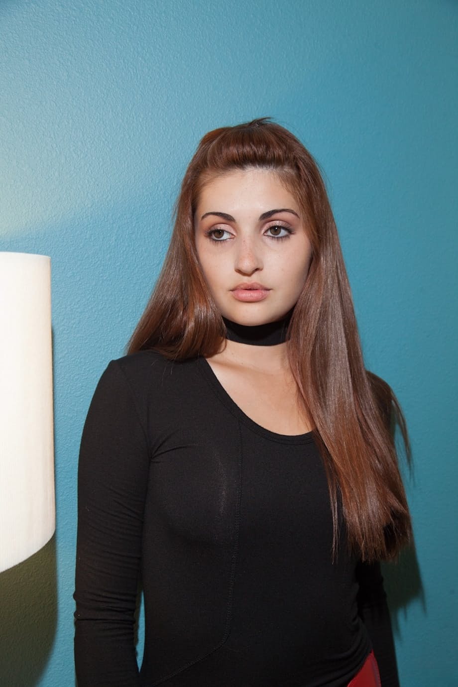 Slutty teen secretary Jade Couture poses provocatively in hot lingerie at work