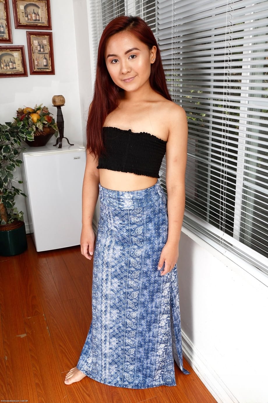 Redhead Asian teen Elle Voneva showcases her yummy feet and delicious holes