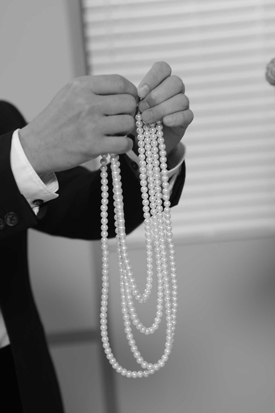 Classy female with big natural tits is gifted a pearl necklace before fucking