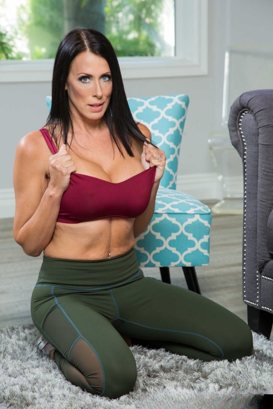 Hot brunette Reagan Foxx teasing with her dazzling naked body on the carpet