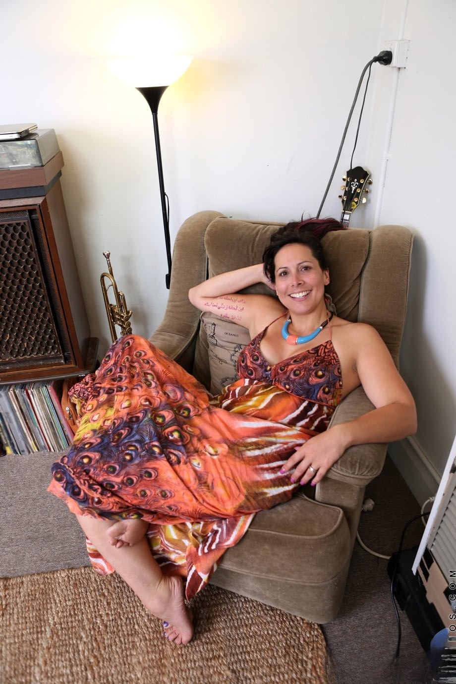 Hot wife Jade Winters doffs her dress and displays her sexy curves