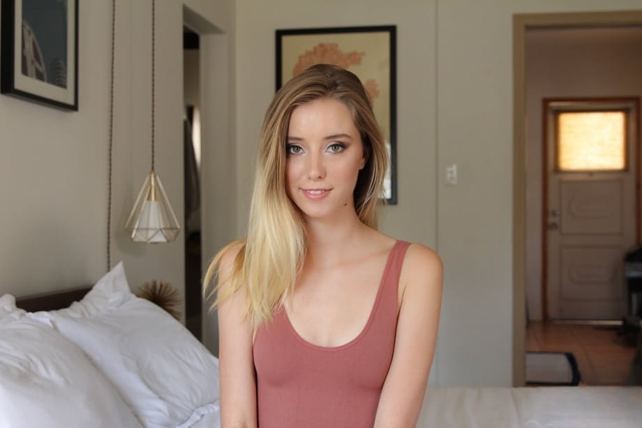Slender blonde Haley Reed shows her trimmed pussy while pleasuring a cock
