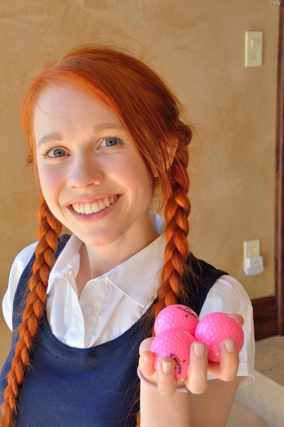 Ginger schoolgirl Dolly inserts a huge fake cock & Ben Wa balls into her pussy