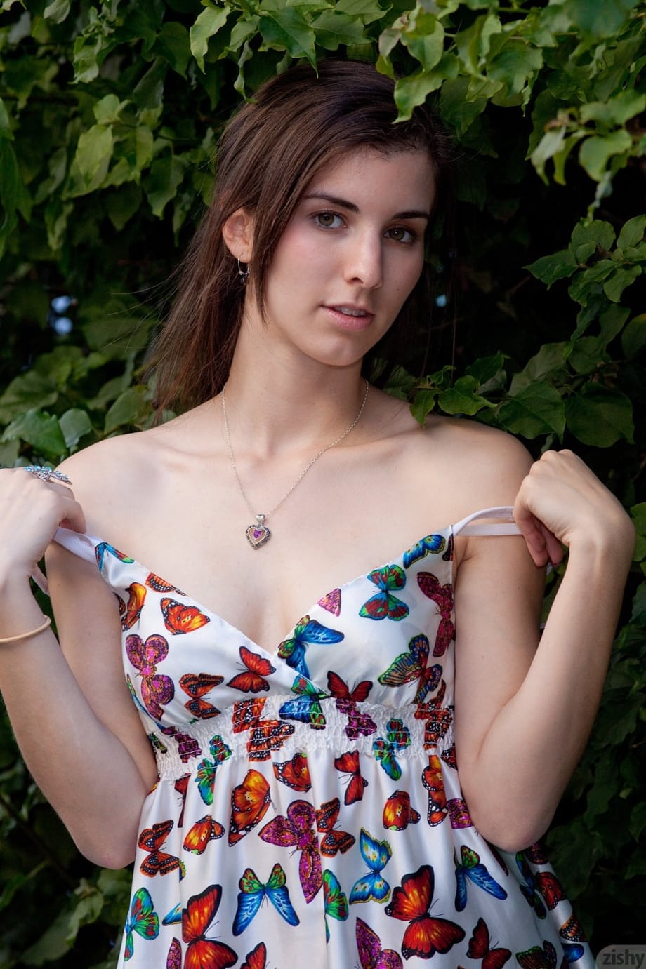 Adorable amateur teen Melissa Johnston removes her dress and poses in undies