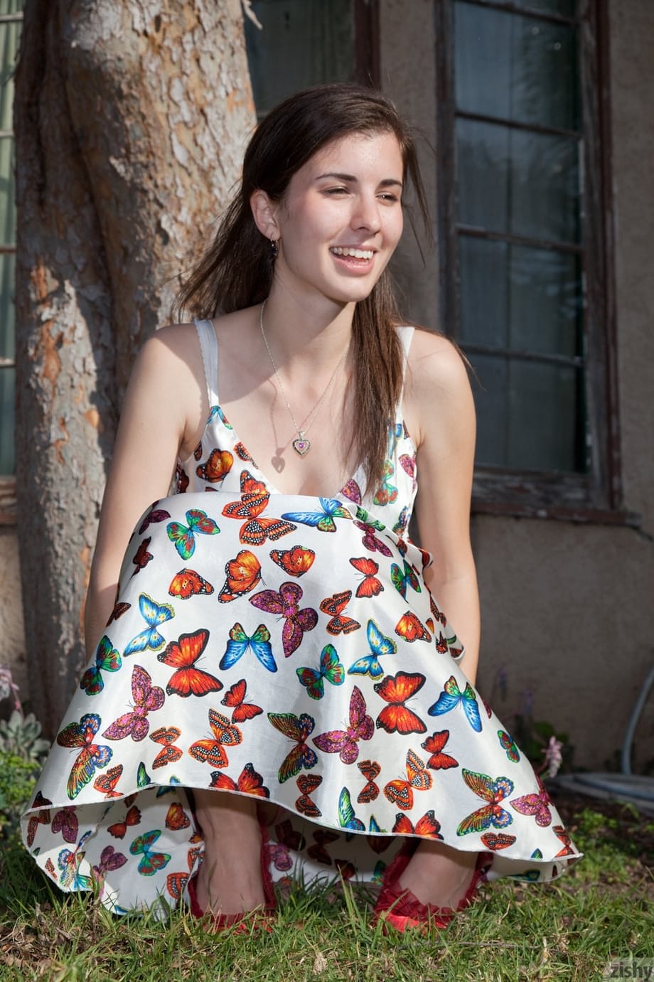 Adorable amateur teen Melissa Johnston removes her dress and poses in undies