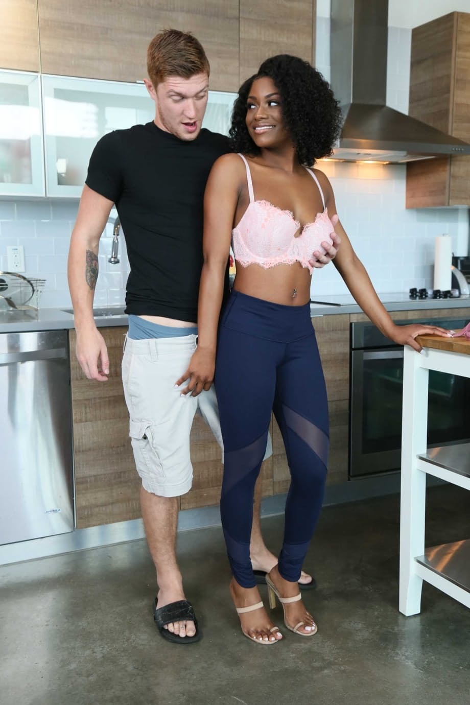 Afro-American girlfriend Evi Rei sucks a white prick & takes it from behind