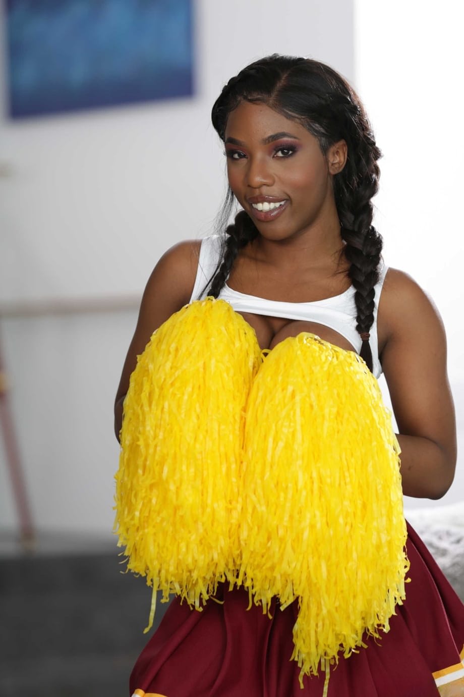 Sexy ebony cheerleader Sarah Banks reveals her big boobs & chocolate pussy