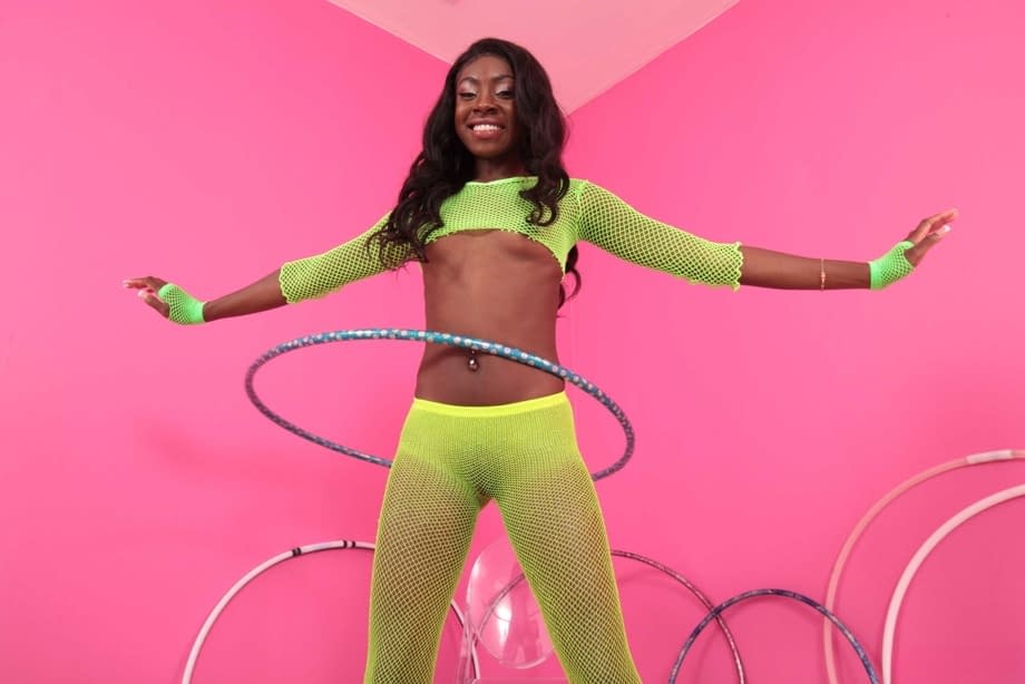 Slim black girl Anne Amari exposes her tiny titties and yummy ass in a solo