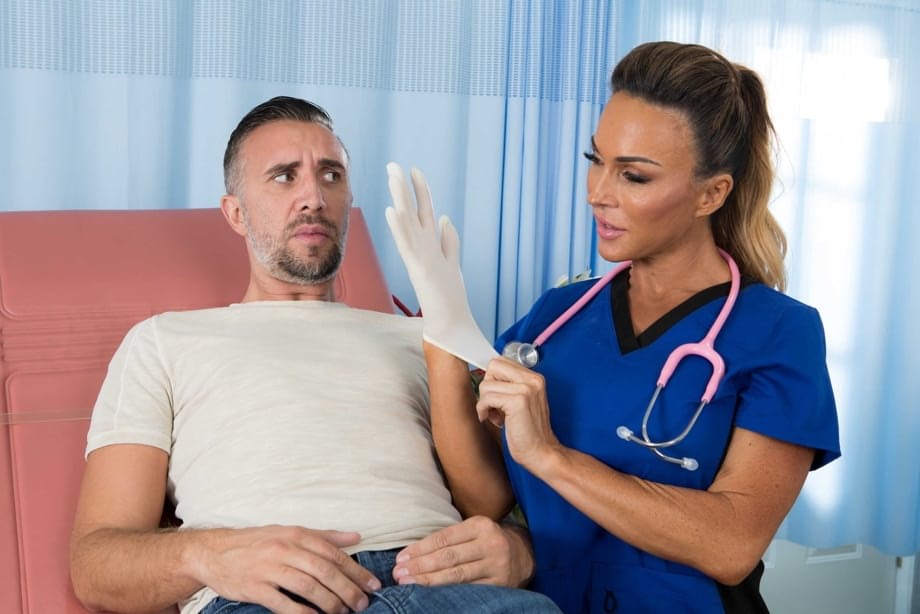 Doctor with big tits Aubrey Black gives her patient a BJ & rides his huge dick