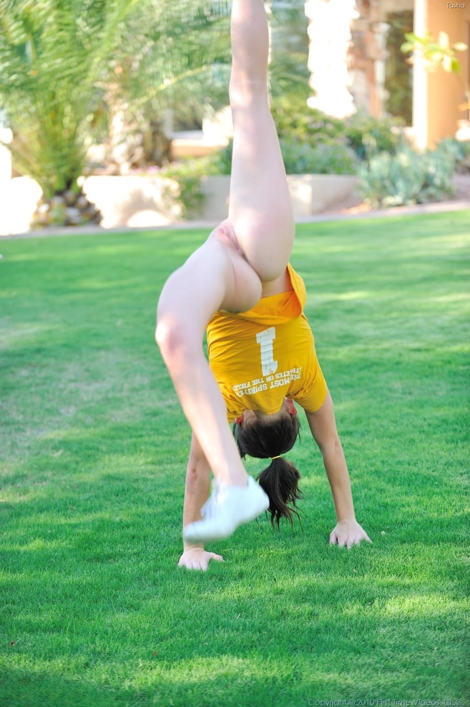 Naughty babe Tasha fists herself & sits on a cone dildo after a kinky workout