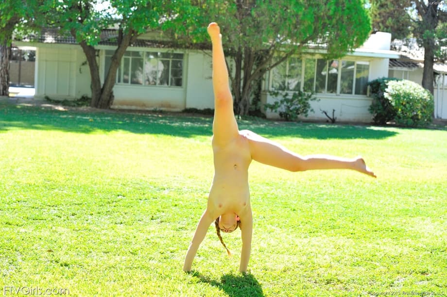 Skinny teen Aurielee shows her incredible ass and small boobs in the park