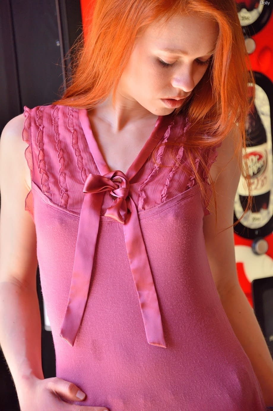 Sexy redhead schoolgirl Dolly stuffing beads into her fresh gaping vagina