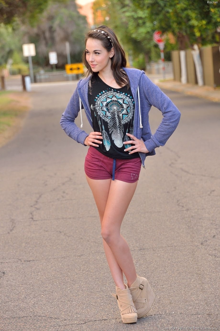 Skinny amateur teen Rachel slowly takes off her clothes and poses in public