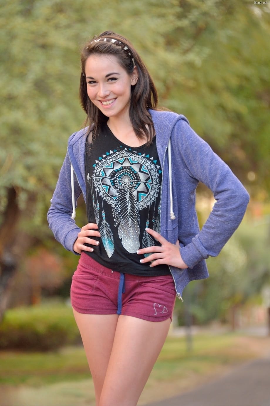 Skinny amateur teen Rachel slowly takes off her clothes and poses in public