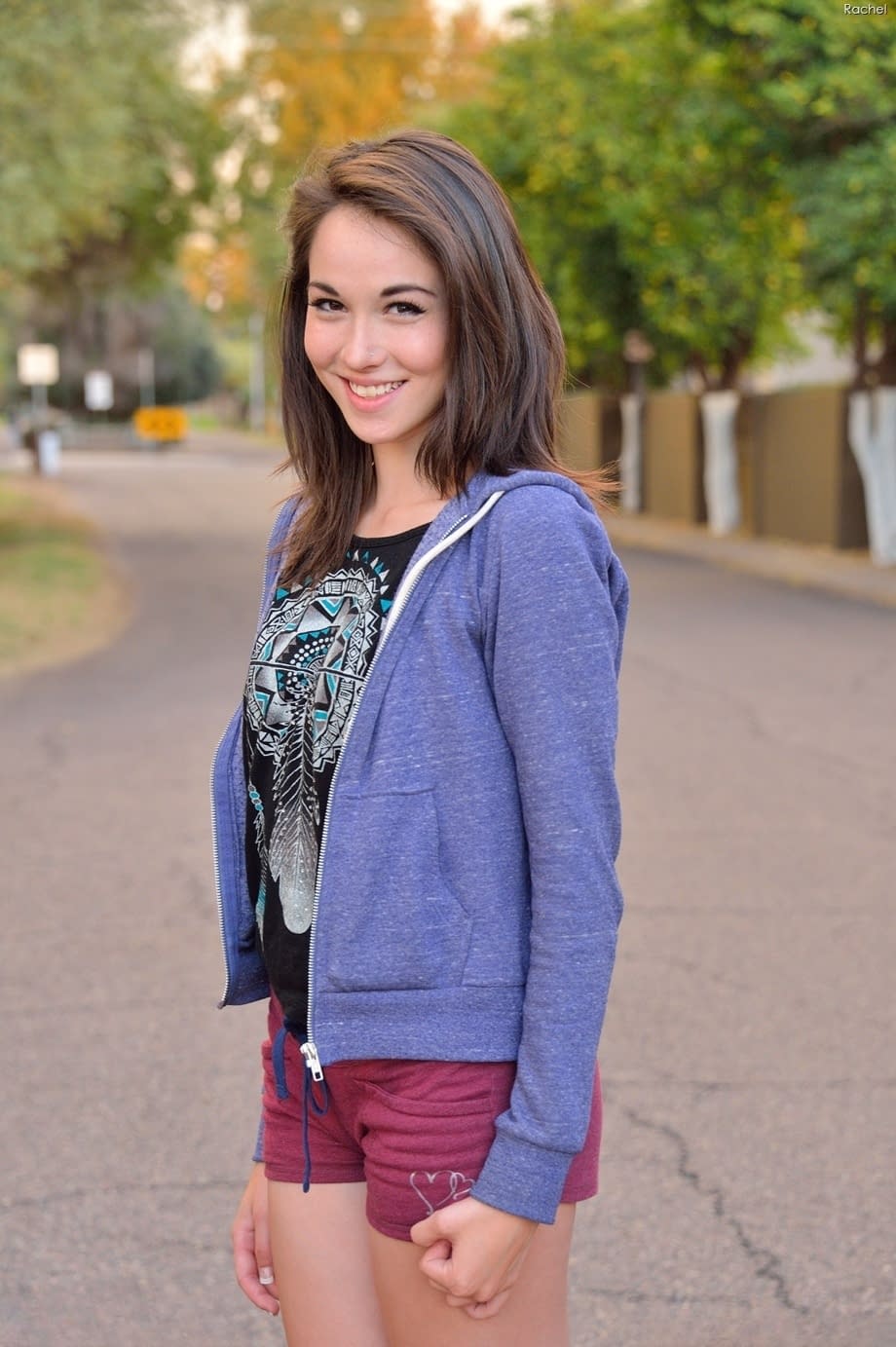 Skinny amateur teen Rachel slowly takes off her clothes and poses in public