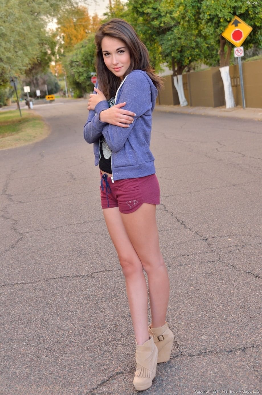 Skinny amateur teen Rachel slowly takes off her clothes and poses in public