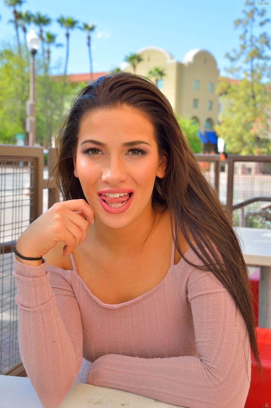 Hot girl Olivia Nova pulls down her dress to expose her ass in public