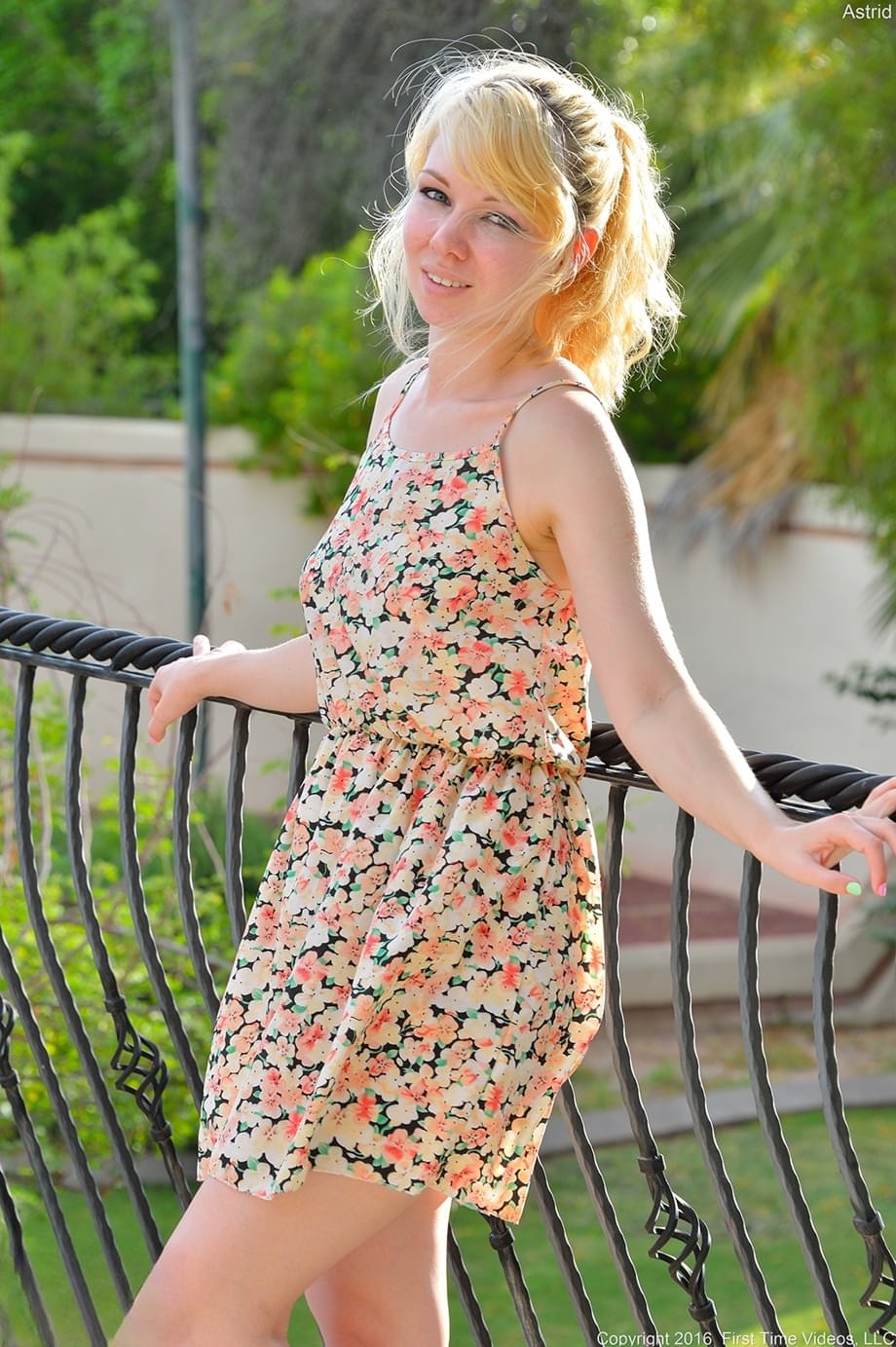 Blonde cutie Astrid reveals her titties and flashes her pussy in public