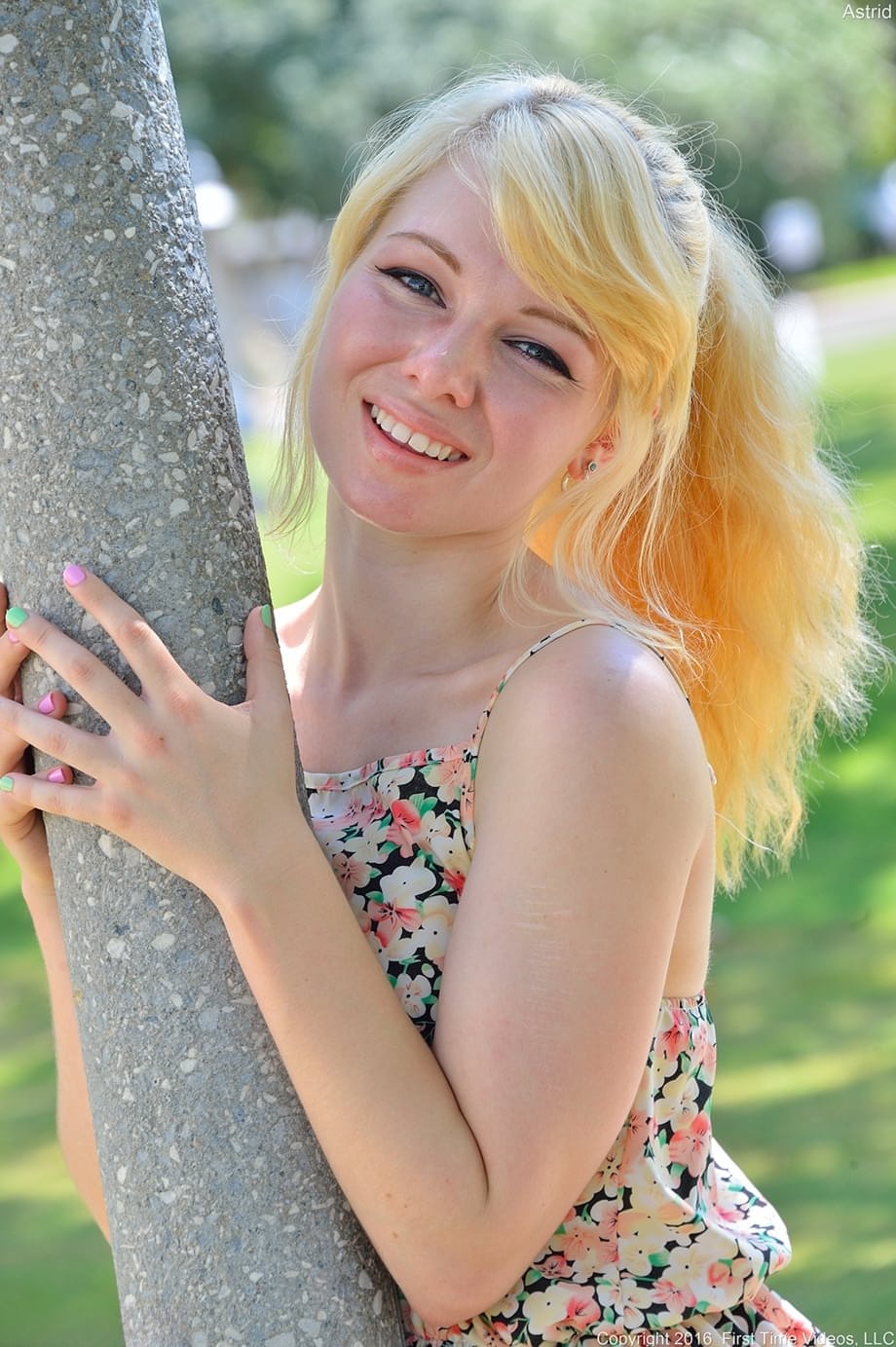 Blonde cutie Astrid reveals her titties and flashes her pussy in public