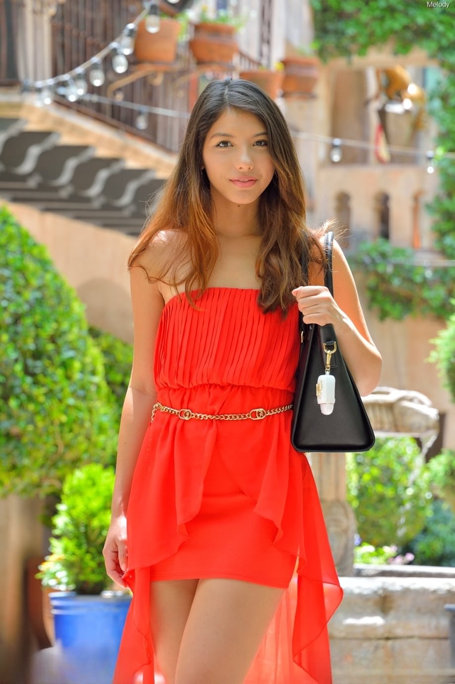 Natural hottie in a long red dress Melody flashing her bald pussy in public
