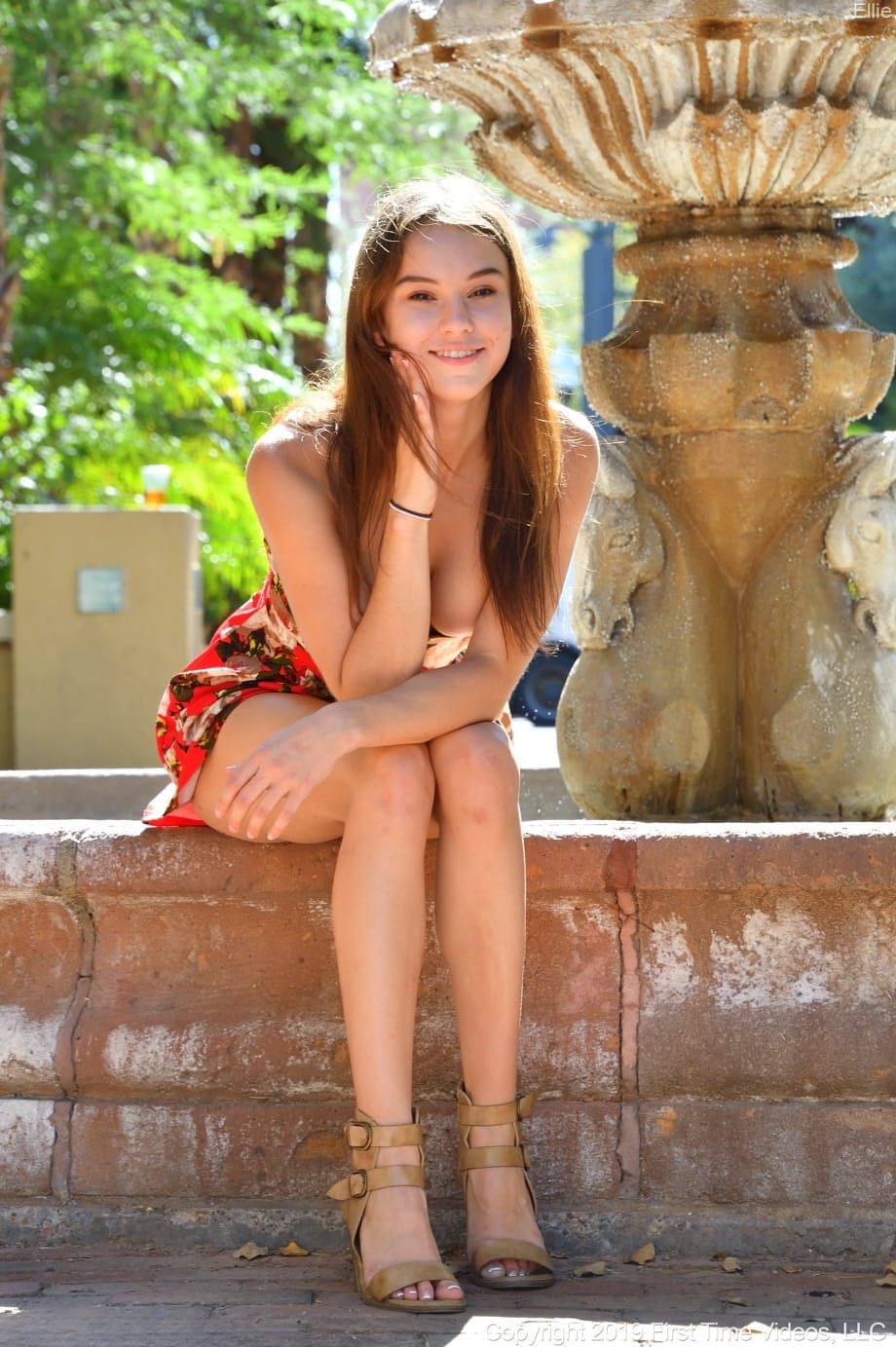 Amateur teen Ellie wears high heels while flashing her tiny tits & ass