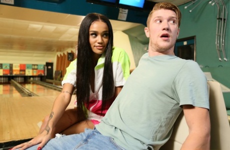 Ebony teen Julie Kay has sexual intercourse with a boy at a bowling alley